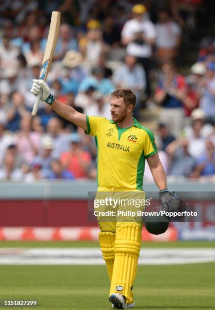 Aaron Finch of Australia celebrates his century during the ICC Cricket World Cup Group Match between England and Australia at Lord's on June 25, 2019...