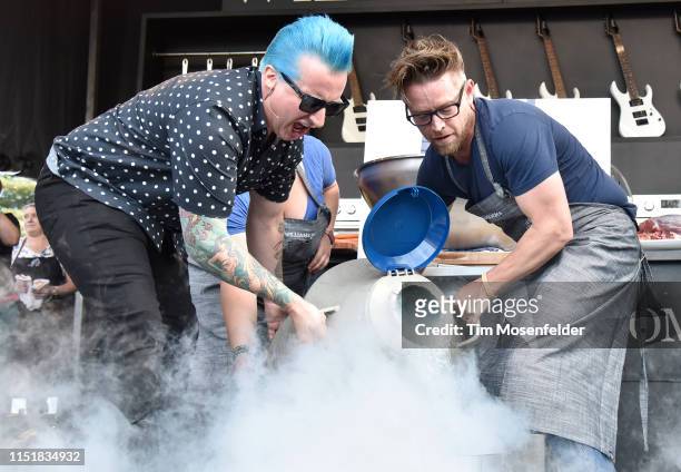 Tre Cool of Green Day and Richard Blais attend a cooking demonstration during BottleRock Napa Valley 2019 at Napa Valley Expo on May 25, 2019 in...