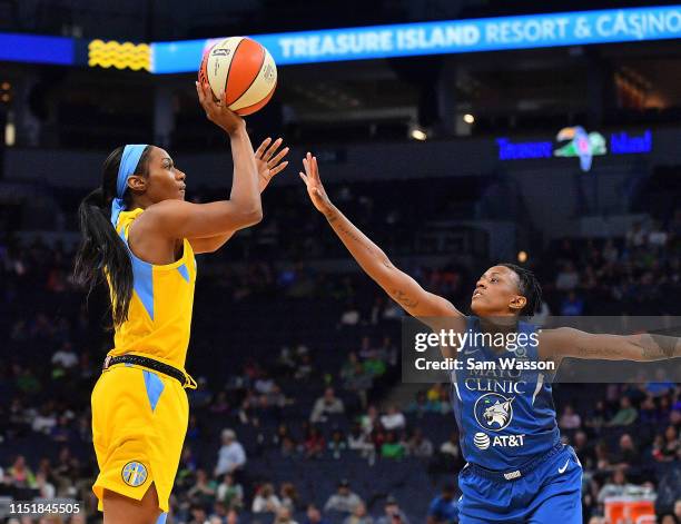 Chloe Jackson of the Chicago Sky shoots against Danielle Robinson of the Minnesota Lynx during their game at Target Center on May 25, 2019 in...