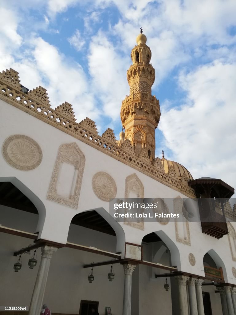 Al-Azar mosque courtyard and one of its minarets. Cairo