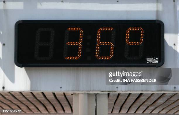 Display shows the temperature of 36 degree Celsius at a swimming pool in Essen, western Germany, on June 25, 2019. Europeans are set to bake in what...
