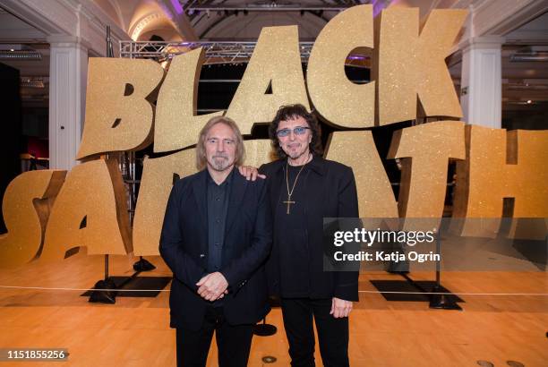 Tony Iommi and Geezer Butler of Black Sabbath attend a photocall ahead of the opening of Home Of Metal: Black Sabbath 50 Years Anniversary exhibition...