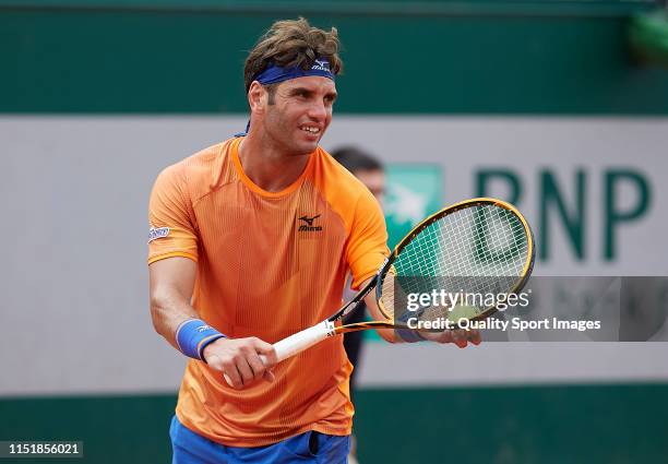 Malek Jaziri of Tunisia serves in his mens singles first round match against Oscar Otte of Germany during Day one of the 2019 French Open at Roland...