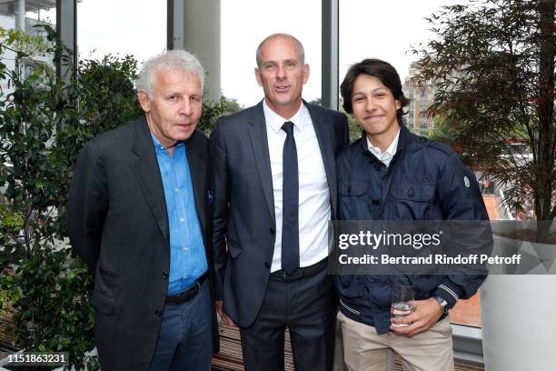 Director of Roland Garros tournament, Guy Forget standing between Patrick Poivre d'Arvor and his grandson Joachim Poivre d'Arvor attend the 2019...