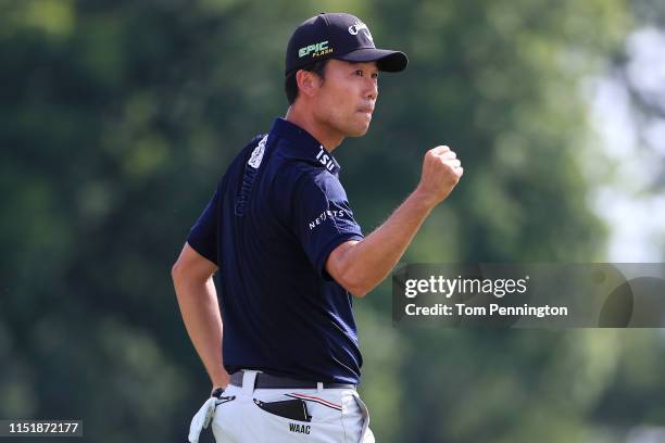 Kevin Na of the United States celebrates on the 18th green after making a putt to win the Charles Schwab Challenge at Colonial Country Club on May...
