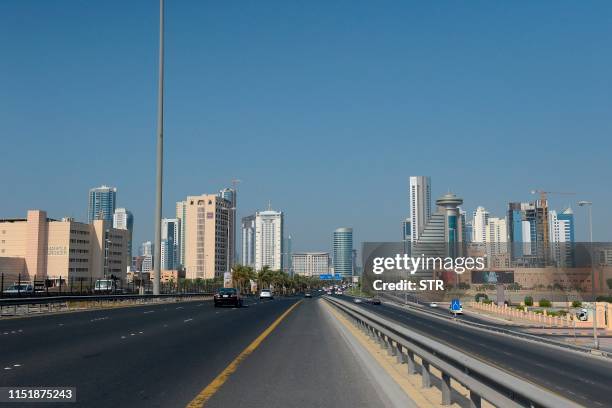 Picture taken on June 25 shows the Bahraini capital Manama skyline. - Co-host the United States is holding out the prospect of $50 billion of...