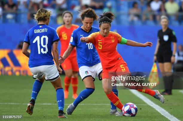 China's defender Haiyan Wu vies with Italy's forward Ilaria Mauro and Italy's forward Valentina Giacinti during the France 2019 Women's World Cup...