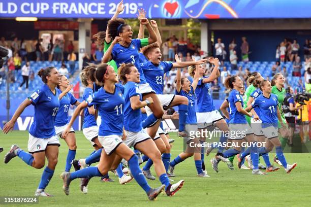 Italy's players celebrate at the end of the France 2019 Women's World Cup round of sixteen football match between Italy and China, on June 25 at La...