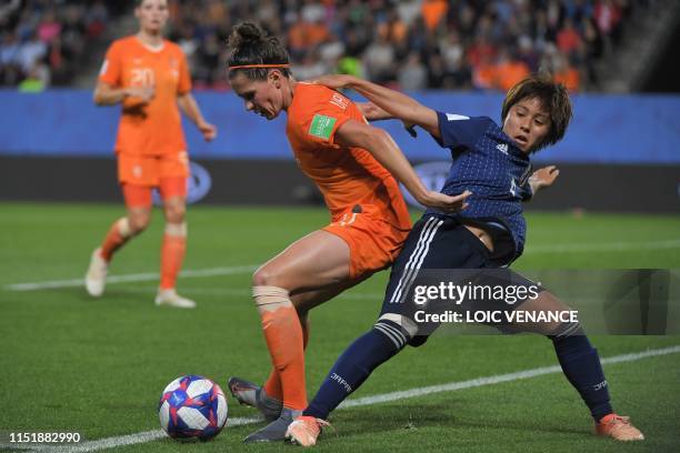 Japan's forward Mana Iwabuchi vies with Netherlands' defender Merel van Dongen during the France 2019 Women's World Cup round of sixteen football...