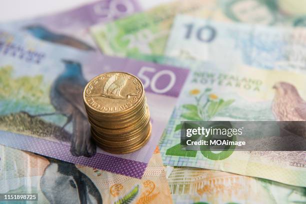 new zealand dollar coins and banknotes - new zealand notes stock pictures, royalty-free photos & images