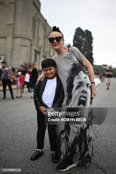 Michael Jackson fans Dominic Lendo and Carla Michael pose for a photo as fans gather to remember the King of Pop on the 10th anniversary of his...