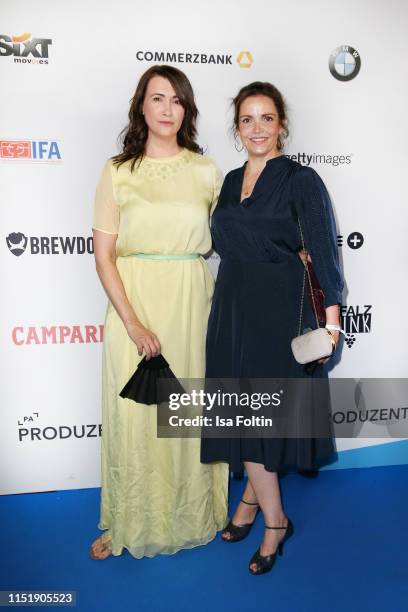 German actress Claudia Mehnert and German actress Rebecca Immanuel attend the summer party of the German Producers Alliance on June 25, 2019 in...