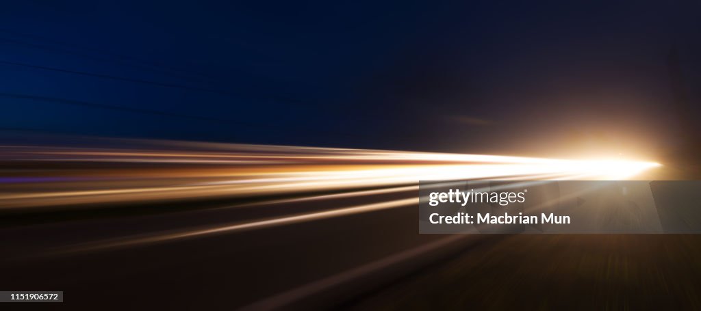 Light trails with zoom blur effect for abstract background