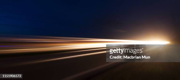 light trails with zoom blur effect for abstract background - long exposure light trails stock pictures, royalty-free photos & images