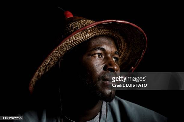 Years-old Fulani herdsman Isa Ibrahim poses for a portrait inside his house at Kachia Grazing Reserve, Kaduna State, Nigeria, on April 16, 2019. Isa...