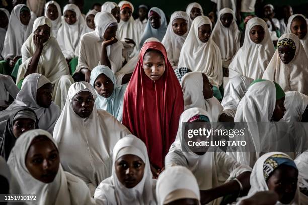 Group of Fulani girls attend the day's lessons inside a classroom at Wuro Fulbe Nomadic School in Kacha Grazing Reserve for Fulani people, Kaduna...