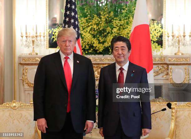 President Donald Trump and Japanese Prime Minister Shinzo Abe pose for a photo ahead of their meeting at Akasaka Palace, Japanese state guest house...