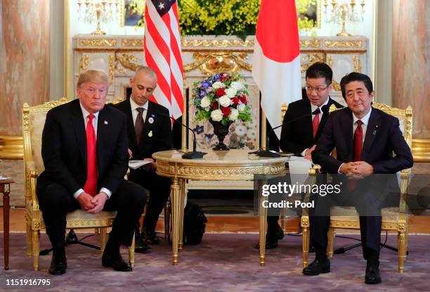 President Donald Trump, left, and Japanese Prime Minister Shinzo Abe hold a talk at Akasaka Palace, Japanese state guest house on May 27, 2019 in...