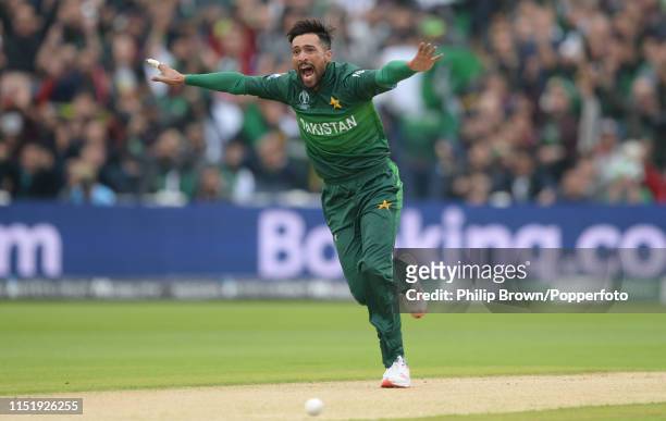 Mohammad Amir of Pakistan celebrates after dismissing Martin Guptill during the ICC Cricket World Cup Group Match between New Zealand and Pakistan at...