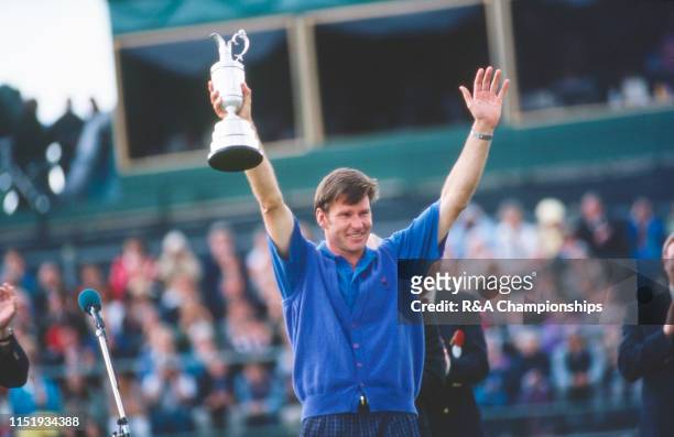Nick Faldo of England holds the Claret Jug following his victory during The 121st Open Championship held at Muirfield Golf Links from July 16-19,1992...