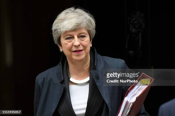 British outgoing Prime minister Theresa May leaves 10 Downing Street to attend weekly Prime Ministers Questions session at the House of Commons,...