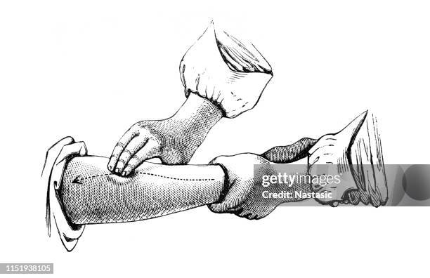 massaging the arm - hand massage stock illustrations