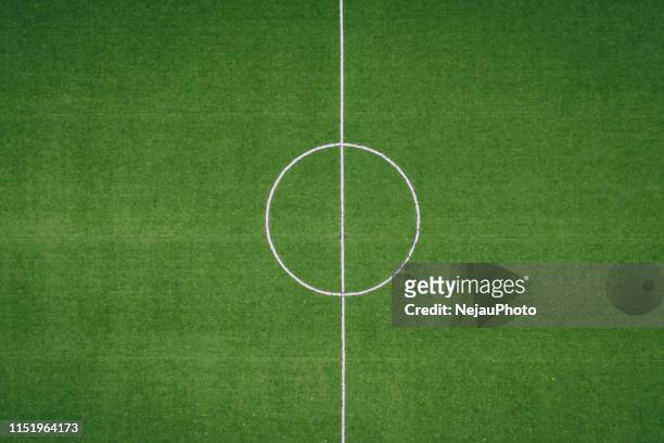 high angle view of soccer field - fußball spielball stock-fotos und bilder