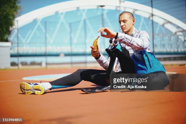 taking a break at sports court. - athlete stock pictures, royalty-free photos & images