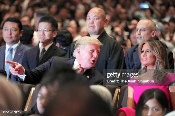 President Donald Trump and First Lady Melania Trump enjoy watching sumo bouts on day fifteen of the Grand Sumo May Tournament at Ryogoku Kokugikan on...