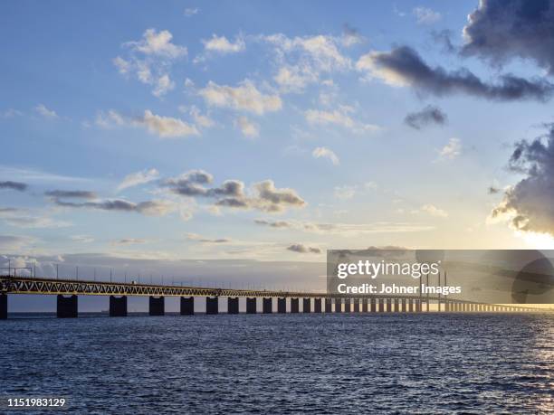 bridge at sunset - oresund bridge stock pictures, royalty-free photos & images
