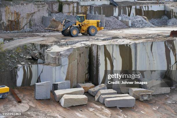 bulldozer in quarry - marble quarry ストックフォトと画像