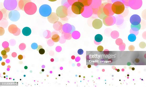 abstract multicolored bokeh sparkling spray circle - round confetti colors stock-fotos und bilder