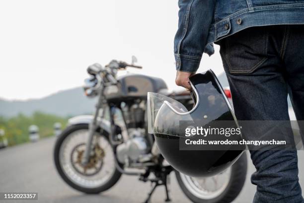 safety guarantee. before driving the motorcycle. - image. - crash helmet fotografías e imágenes de stock