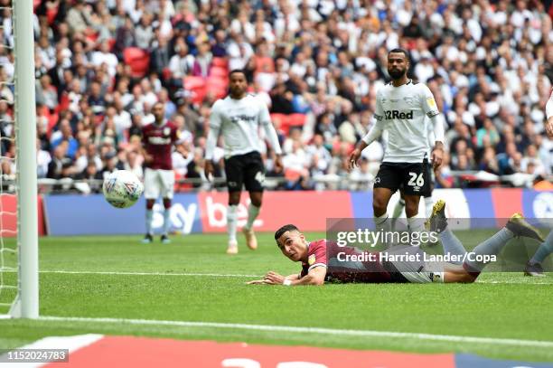 Anwar El Ghazi of Aston Villa scores his team's first goal during the Sky Bet Championship Play-off Final match between Aston Villa and Derby County...