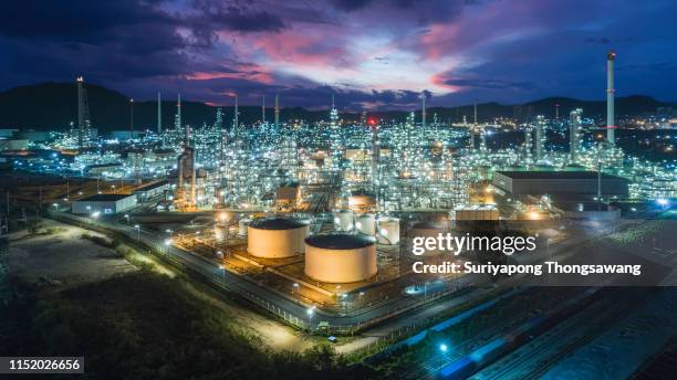 oil refinery factory with beautiful sky at dusk for energy or gas industry background. - refinery stock pictures, royalty-free photos & images