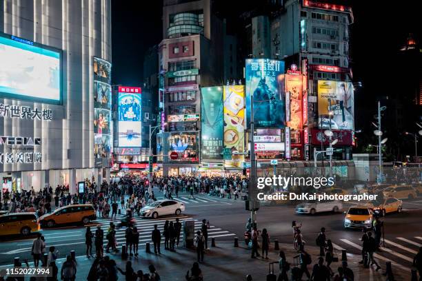 taipei ximen neon billboards  at night - urban square city night stock pictures, royalty-free photos & images