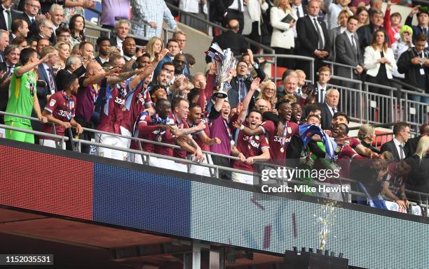 Aston Villa lift the trophy following victory in the Sky Bet Championship Play-off Final match between Aston Villa and Derby County at Wembley...