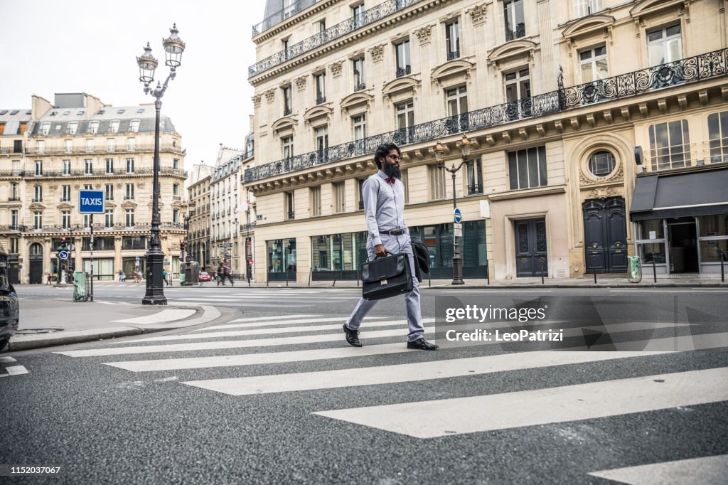 Man commuting to work in the city of Paris