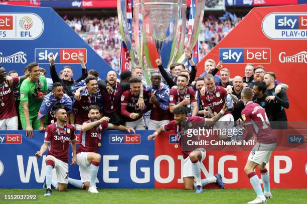 Aston Villa players celebrate victory following the Sky Bet Championship Play-off Final match between Aston Villa and Derby County at Wembley Stadium...