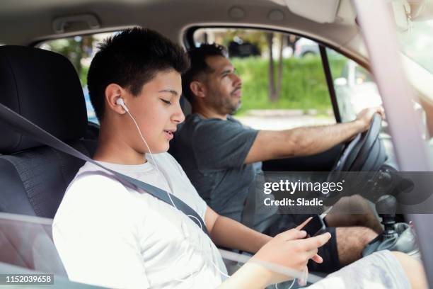 spending day with dad - motorheadphones stock pictures, royalty-free photos & images