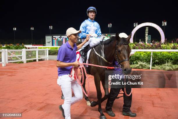 Jockey Vlad Duric riding Top Knight wins Race 8 Singapore Guineas at Kranji Racecourse on May 25, 2019 in Singapore.