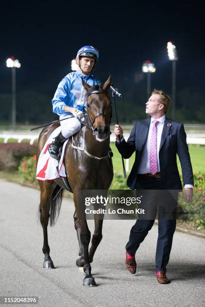 Jockey Vlad Duric riding Top Knight wins Race 8 Singapore Guineas at Kranji Racecourse on May 25 , 2019 in Singapore.