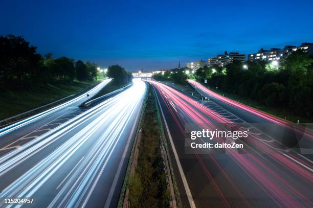 autobahn light trails - autobahn germany stock pictures, royalty-free photos & images