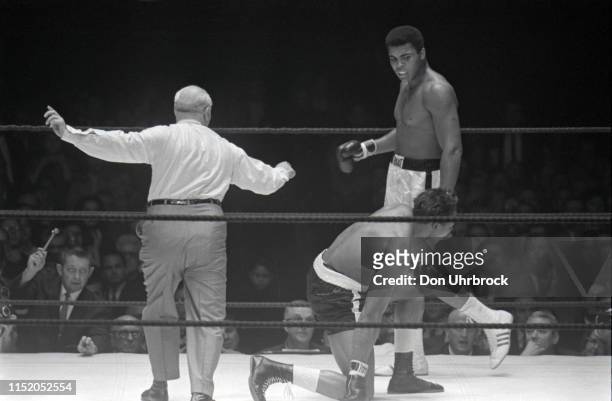 World Heavyweight Title: Muhammad Ali in action after knockdown vs Cleveland Williams getting up from canvas at Astrodome. Houston, TX CREDIT: Don...