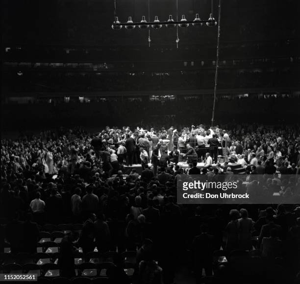 World Heavyweight Title: Aerial view of Muhammad Ali walking off the ring with crowd and media after fight vs Cleveland Williams at Astrodome....