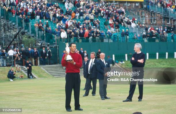 Tiger Woods of the United States holds the Claret Jug following his victory during The 129th Open Championship held on the Old Course at St Andrews,...