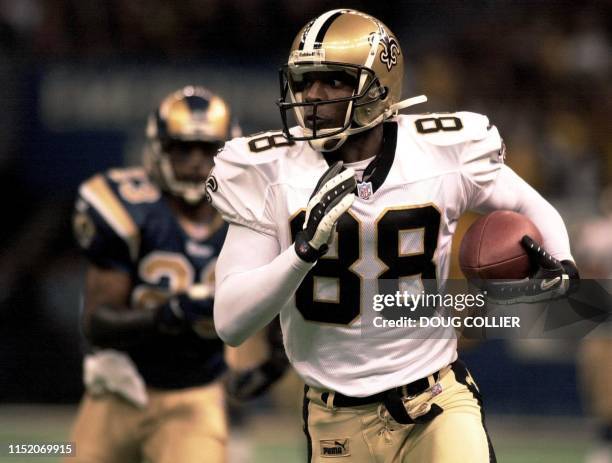 New Orleans Saints' Willie Jackson runs for a 50-yard first down during second quarter action of their NFC Wildcard game against the Saint Louis Rams...