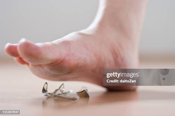 human foot with broken glass - man walking feet inside stock pictures, royalty-free photos & images