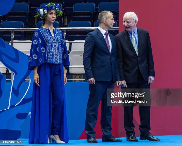 Former International Olympic Committee member, Patrick Hickey, here on the right chats to EJU President Sergey Soloveychik before presenting the team...