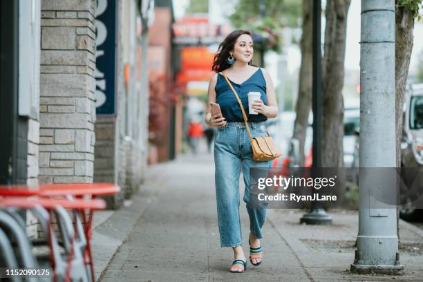 fashionable latina woman in west seattle - seattle coffee stock pictures, royalty-free photos & images